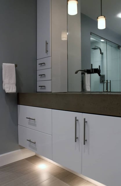 Villa Builders remodeled bathroom in Annapolis featuring stylish vanity lighting