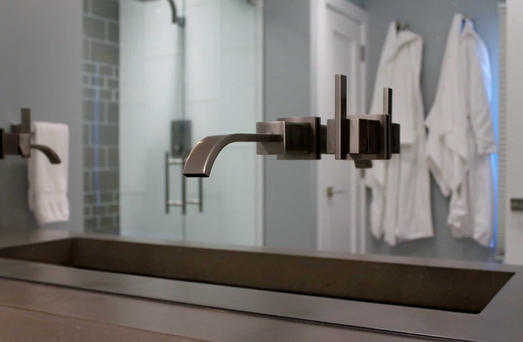 Central Maryland bathroom renovation by Villa Builders with a modern faucet design