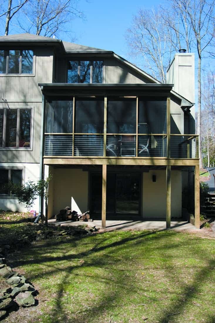 Screened porch addition to a custom home by Villa Builders in Central Maryland