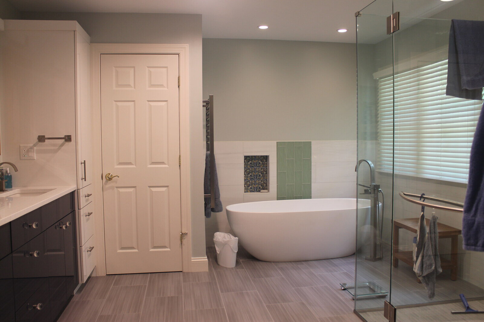 Luxury bathroom remodel with a soaking tub and glass-enclosed shower by Villa Builders in Annapolis, MD