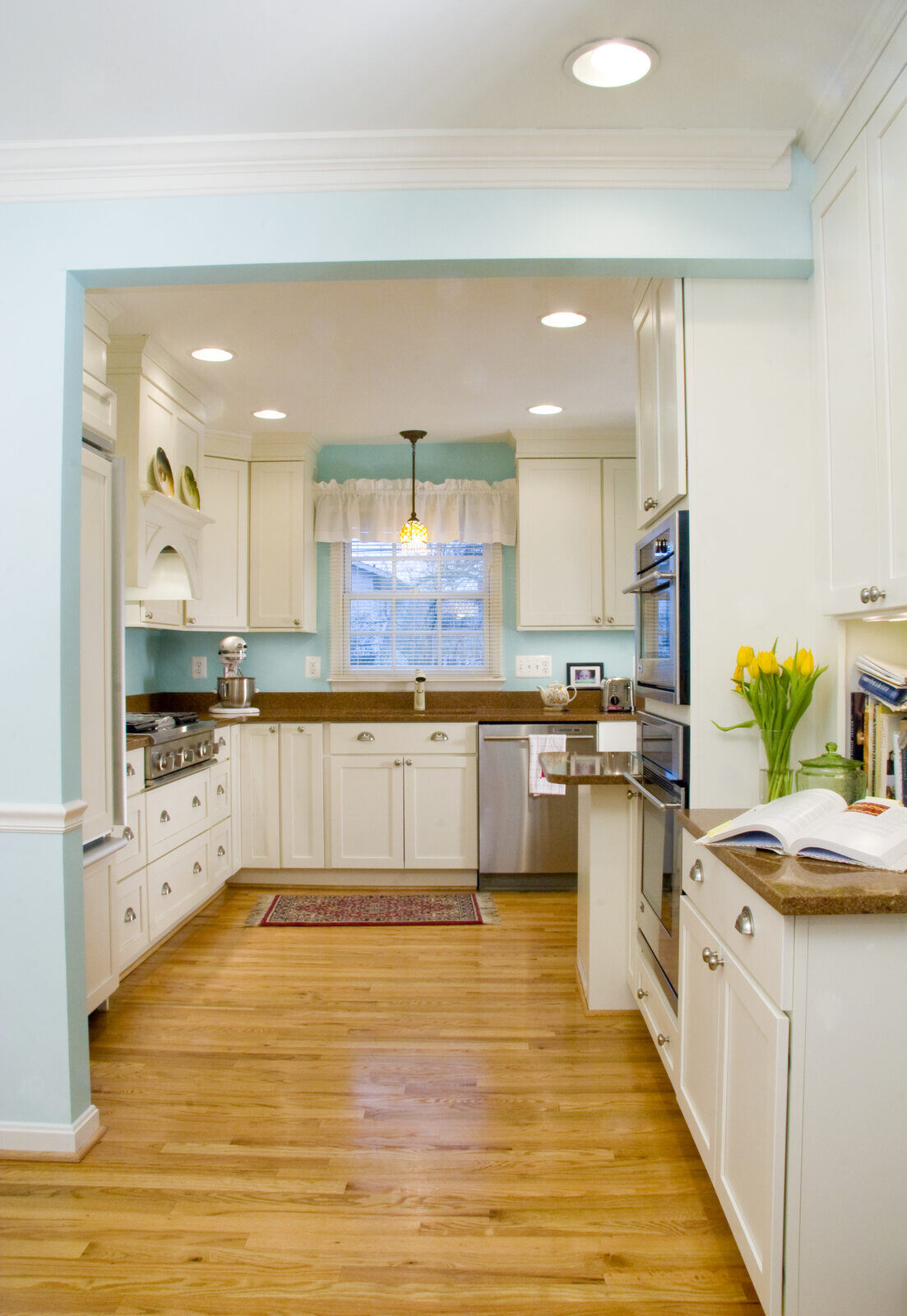 Bright and airy kitchen renovation featuring vintage-style decor, designed by Villa Builders in Annapolis, MD